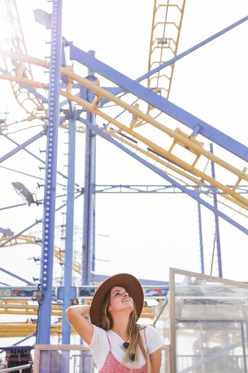 happy-young-girl-amusement-park_23-2147918073